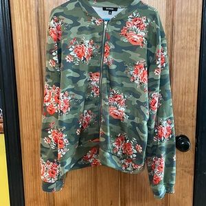 Zip up long sleeve plus size shirt.